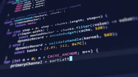 Close up macro shot of a computer screen with typing JavaScript code Vídeos de archivo 340841044