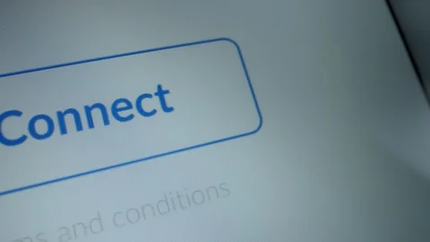 Close-up Macro Shot: Device Screen with Website Showing "Connect" Button Stock Footage 121795844