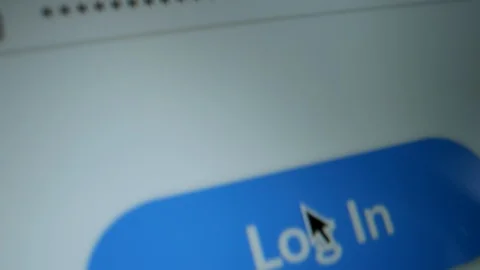 Close-up Macro Shot: Device Screen with Website Showing Blue "Log In" Button Stock Footage 121795995
