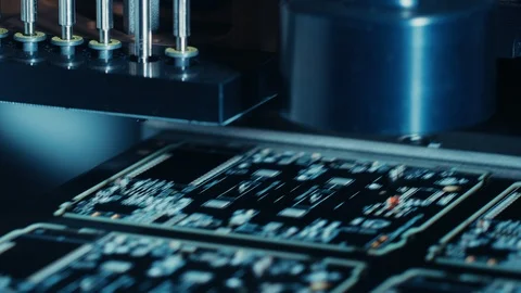 Close-up Macro Shot of Electronic Printed Circuit Board Being Assembled Stock Footage 98185395
