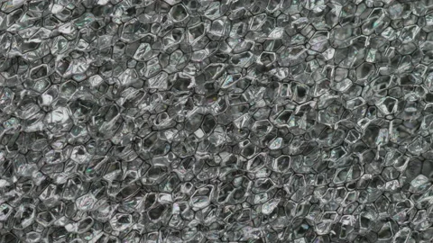 Close up macro shot of grey synthetic packing foam rotating 02. 4K locked tripod Stock Footage 153570264