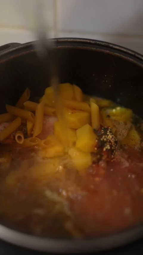 Close-up macro shot inside a black cooking pot Stock Footage 329116758
