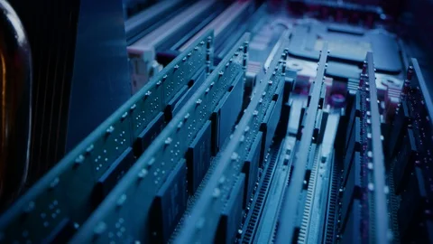Close-up Macro Shot: Inside of Computer Case. Camera Moves Over PCB Motherboard Stock Footage 121797132