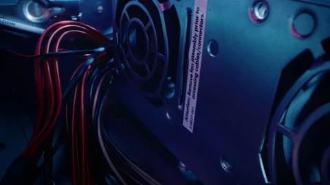 Close-up Macro Shot: Inside Computer Case. Camera Moves Alongside Row of Coolers Stock Footage 121797292