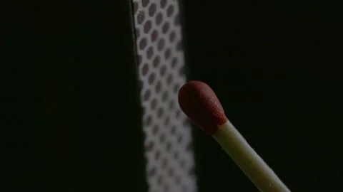 Close up macro shot of lighting a match in slow motion.match-fire Ignition Stock Footage 132184982
