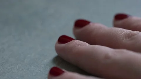Close up macro shot of manicured red finger nail. Woman's cosmetic, beautiful Stock Footage 171956131