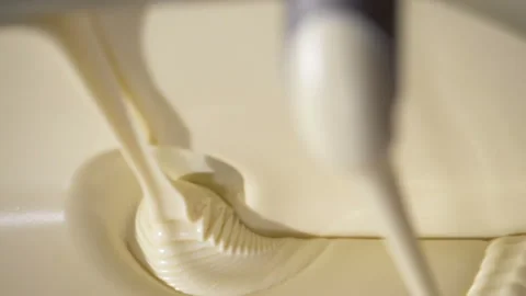 Close-up macro shot melted liquid white chocolate sauce . Stock Footage 170310887