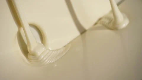 Close-up macro shot melted liquid white chocolate sauce . Stock Footage 170311065