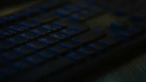 Close-up Macro Shot: Person Using Black Computer Keyboard, Pressing Enter Button Stock Footage 121796797
