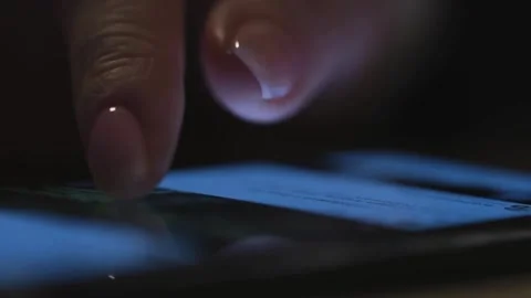 Close-up macro shot of person using smartphone browsing pictures on social .. Stock Footage 272780431