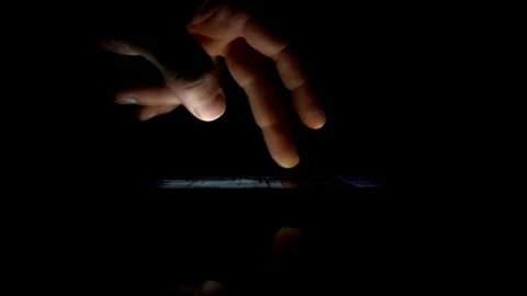 Close-up macro shot of person using smartphone browsing pictures on social Vídeos de archivo 336249017