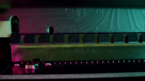 Close-up macro shot of printed circuit board in motherboard in gaming computer Stockbeeldmateriaal 205044654