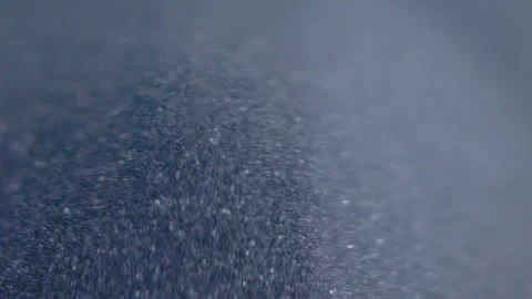 Close up macro shot of sand clock / hourglass sand pouring in slow motion. Stock Footage 273114502