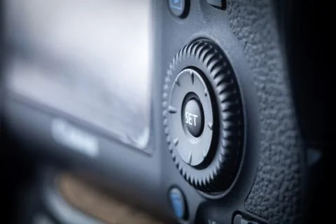 Close-up macro shot of SET button of the modern digital SLR camera. Stock Photos