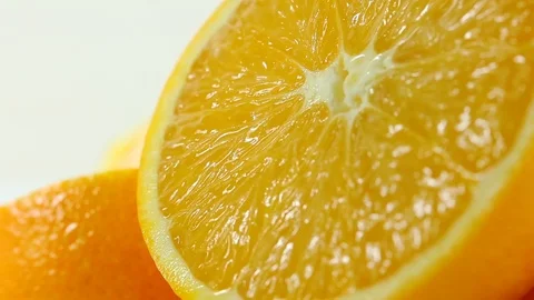 A close-up macro shot of a sliced orange Stock Footage 87857075