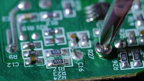 Close up macro shot taking out screw on an electronic chip circuit board Video stock 70239712