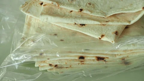 Close macro shot of thin tandoori bread, dough made in tandoori, Stock Footage 142398865