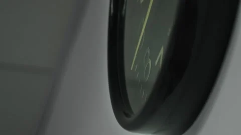 Close-up macro shot time-lapse of black clock face in daytime of office Stock Footage 306843048