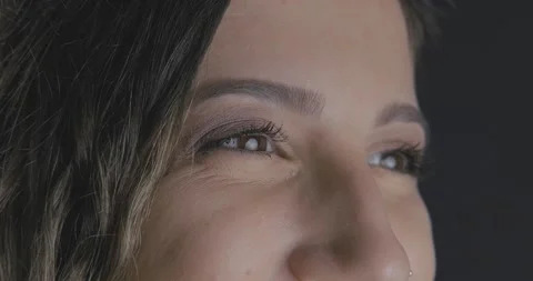 Close up, macro shot of woman's eye. Smiling, happy young beautiful lady's br Stock Footage 139824944