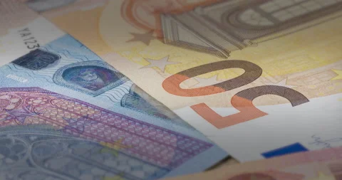 Close up macro slide footage over Euros. Stock Footage 159735379
