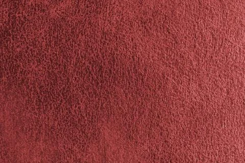 Close up, macro structure of red suede fabric with abstract embossed shabby.. Stock Photos