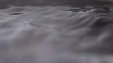 Close up macro of surface boiling water Stock Footage 274233146