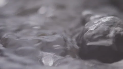 Close up macro of surface boiling water Stock Footage 274233155