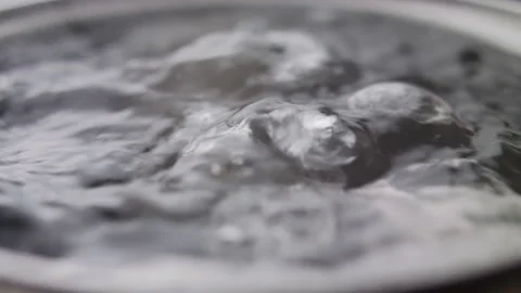 Close up macro of surface boiling water Stock Footage 274233301