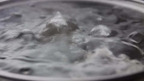 Close up macro of surface boiling water Stock Footage 274233320