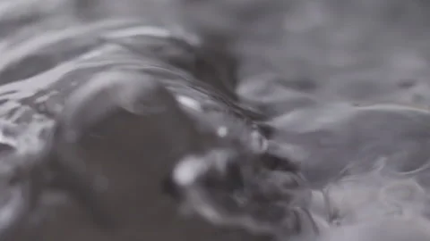 Close up macro of surface boiling water Stock Footage 274233942