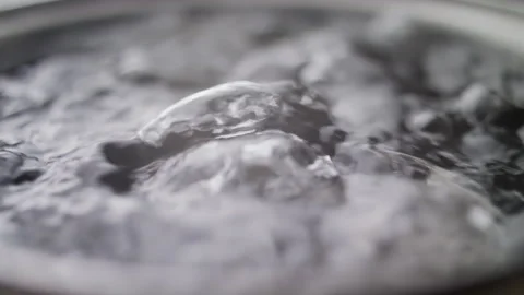 Close up macro of surface boiling water Stock Footage 274233972