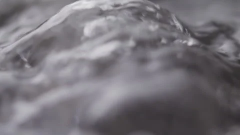 Close up macro of surface boiling water Stock Footage 274234171