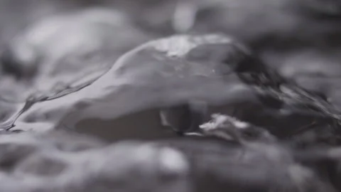 Close up macro of surface boiling water Stock Footage 274234531