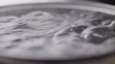 Close up macro of surface boiling water Stock Footage 274234877