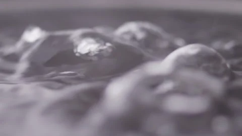 Close up macro of surface boiling water Video stock 274235382