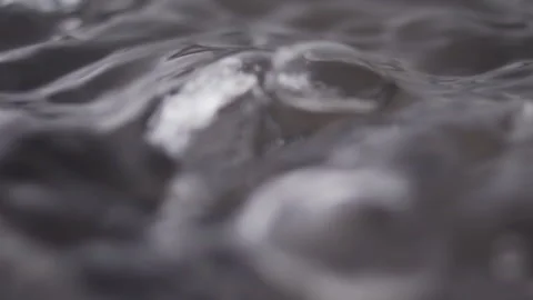 Close up macro of surface boiling water Video stock 274235949