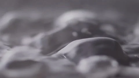Close up macro of surface boiling water Stock Footage 274235986
