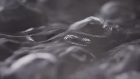 Close up macro of surface boiling water Stock Footage 274236630
