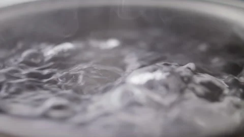 Close up macro of surface boiling water Stock Footage 274237804