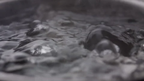 Close up macro of surface boiling water Stock Footage 274237842