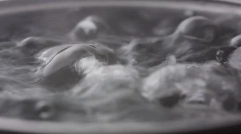 Close up macro of surface boiling water Stock Photos