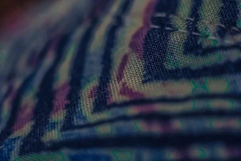 Close up Macro Surface old wool fabric. Colorful textured weave hand drawn Foto stock