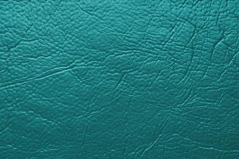 Close up, macro texture of turquoise glossy natural genuine leather, leathe.. Stock Photos