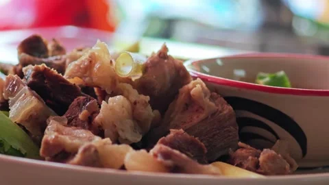 Close-up macro of Thai Northeastern style steamed beef with herbs. Видео 348158126