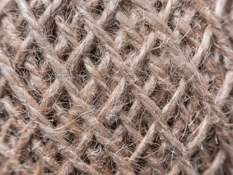 Close up macro with threads twisted together in a ball of strings. Stock Photos