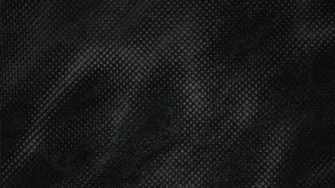 Close up macro video footage of a dark textured fabric with a subtle diamond pat Stock Footage 330290884