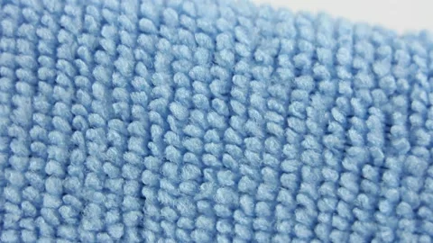 Close-up macro view on blue microfiber dusting cloth, well-absorbing water Stockbeeldmateriaal 160053177