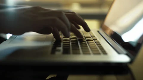 Close-up macro view of businessman or student typing on laptop computer keyboard Vidéo 168532131