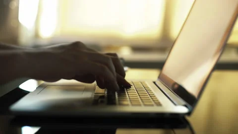 Close-up macro view of businessman or student typing on laptop computer keyboard Vidéo 168536234