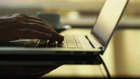 Close-up macro view of businessman or student typing on laptop computer keyboard Vidéo 168678845